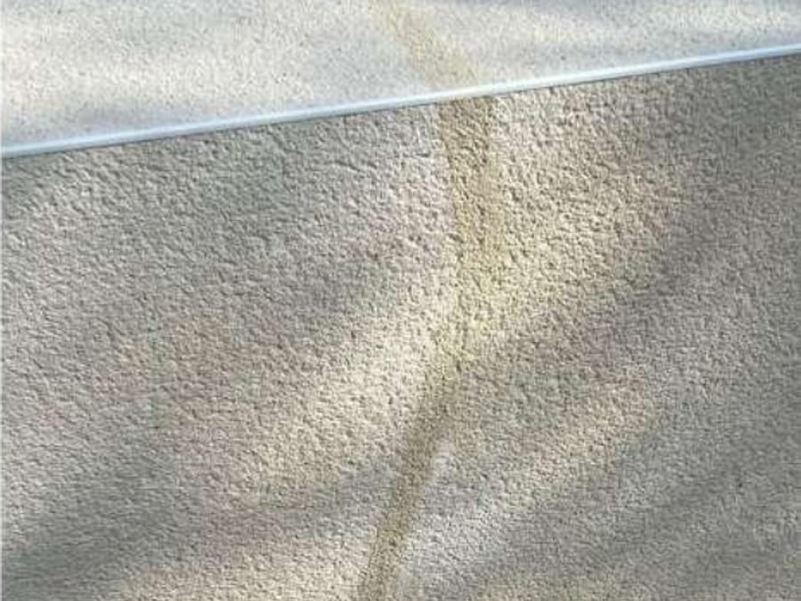 Cracked render repaired, after